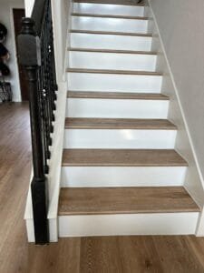 Hardwood stairs adding warmth to the interior.