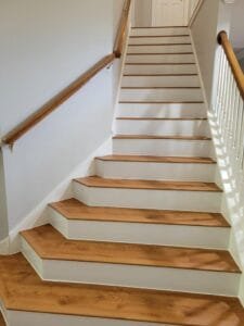 Elegant wooden staircase with a handcrafted railing