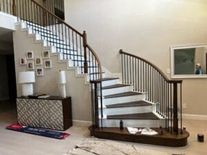 Elegant handrails and balusters installation underway.