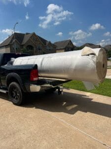 Professional carpet installation in progress.