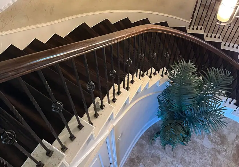 Elegant iron banister installation in Pearland residence